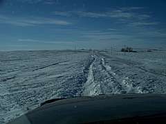 Joy of our winters - full ditches and roads requiring 4WD