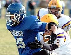 Adam Woroniecki, running back, Richardton-Taylor-Hebron 9-man football team -1200+ yds rushing, 20+ TDs (14 rushing) in '09 season, receives awards for All-Conference & All-Region First Team At Large.10-15-09 in the Dickinson Press, Photo: Dustin Monke.